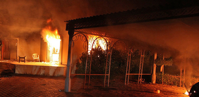 Fire raging at site of Benghazi attack